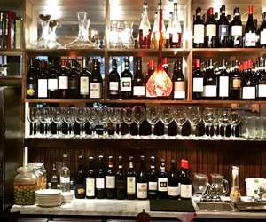 The wine-filled back bar at Sotto Enoteca